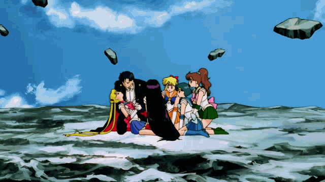 a group of anime characters are laying on the ground in the water