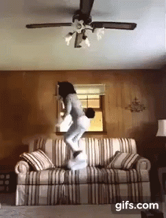 Couch Jumping Corgi GIF - Couch Jumping Corgi Fursuit GIFs
