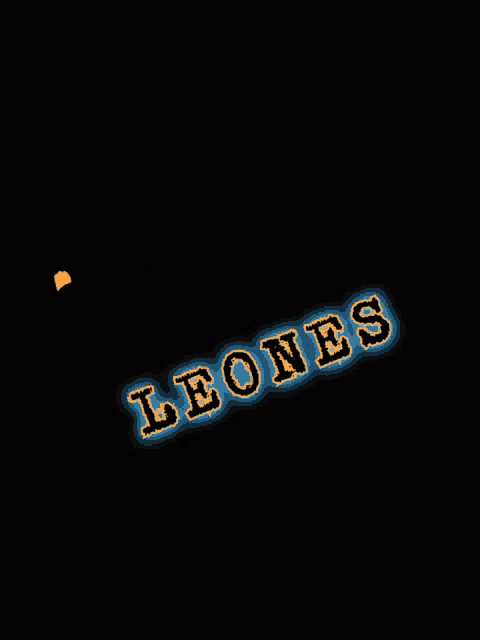 a black background with vamos leones written in orange