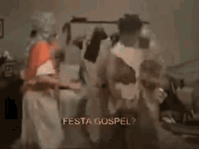 a group of people are standing next to each other in a room with the words festa gospel .