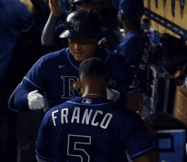 a baseball player wearing a jersey with the number 370
