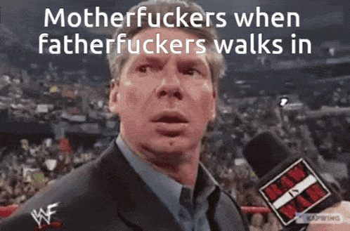 a man in a suit talking into a microphone with the words motherfuckers when fatherfuckers walks in