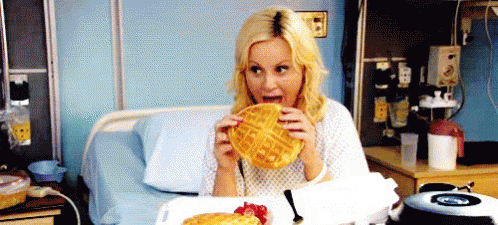 Eating Waffles In The Hospital Bed GIF - Parks And Rec Breakfast Waffles GIFs