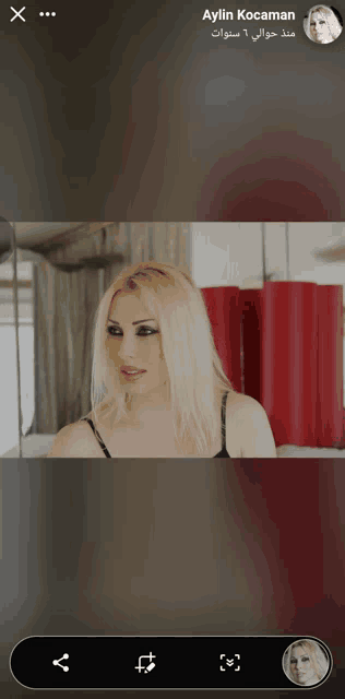 a picture of a blonde woman with aylin kocaman written on the bottom