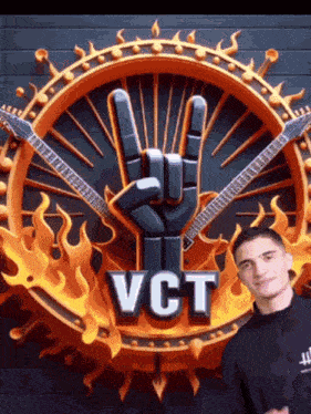a young man stands in front of a sign that says vct