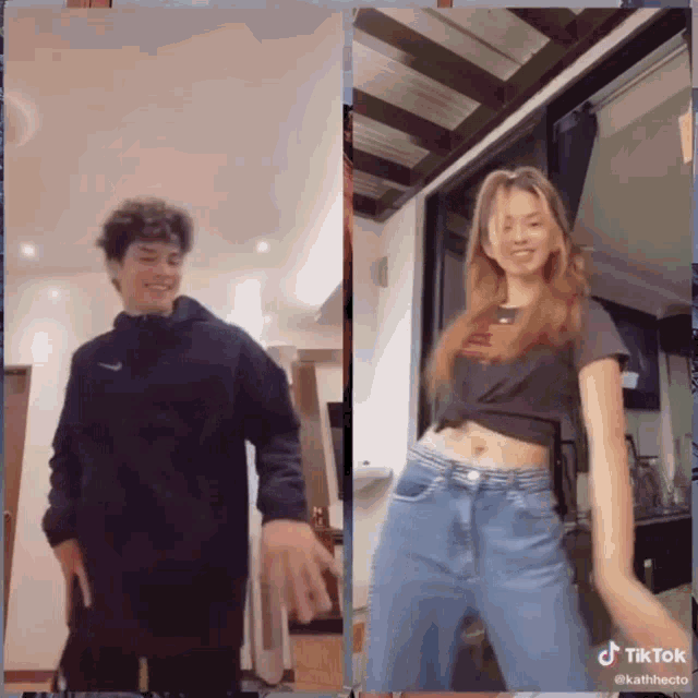 a boy and a girl are dancing together and the girl is wearing a nike crop top
