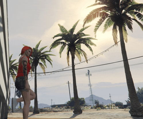a woman with red hair is standing in front of palm trees in a video game