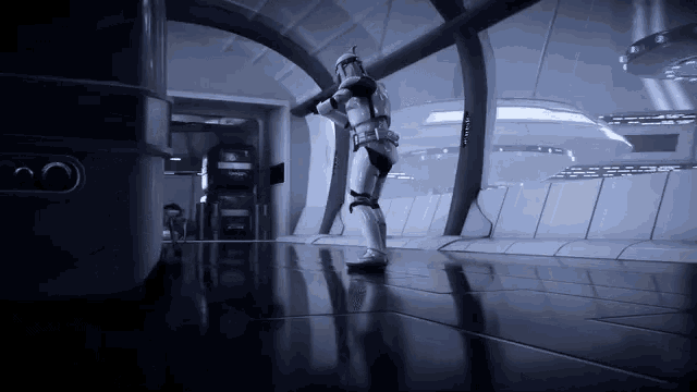a storm trooper is standing in a dark room with a large window