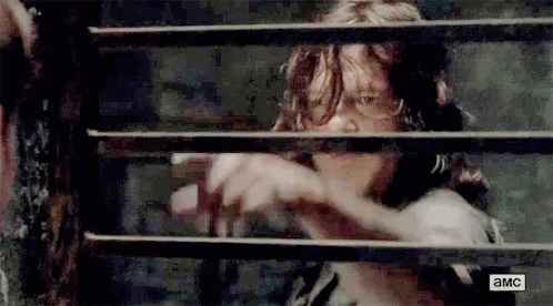 Daryl Dixon Walking Dead GIF - Daryl Dixon Walking Dead Pointing GIFs