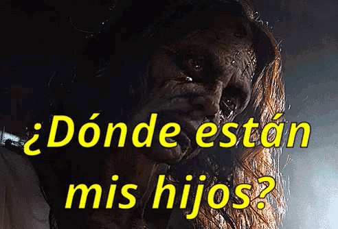 a poster with a woman and the words " donde estan mis hijos " on it