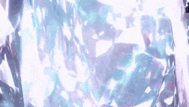 a close up of a purple and blue colored item