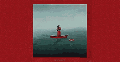 a man in a red boat with a life preserver