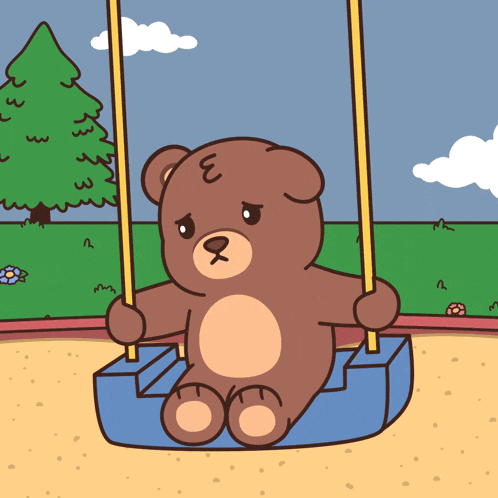 a teddy bear is sitting on a swing with the letter e on his head
