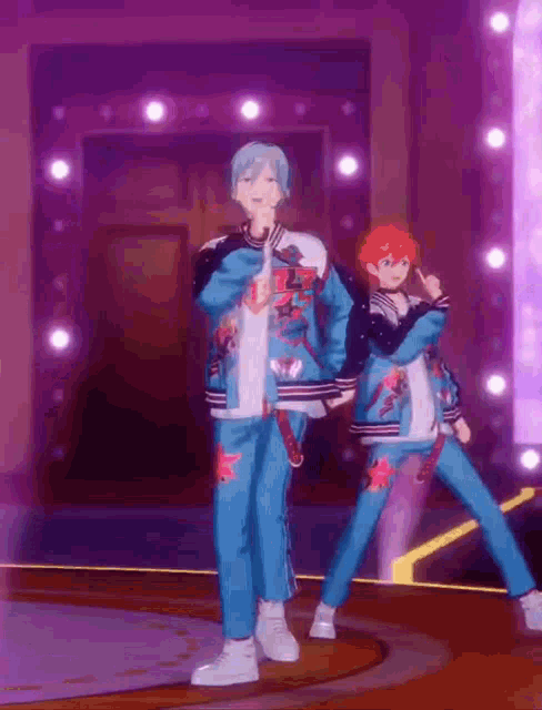 a couple of anime characters are standing on a stage holding microphones .