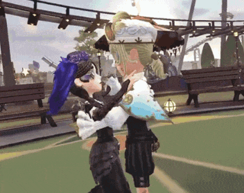 a couple of cartoon characters are hugging each other on a field .