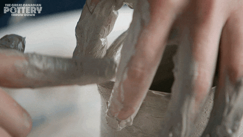the great canadian pottery throw down shows a person working on a pot