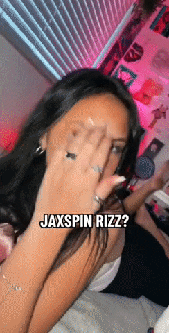 a woman covering her face with her hand and the words jaxspin rizz on the bottom