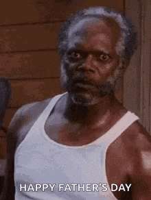 a man with a beard is wearing a white tank top and wishing a happy father 's day .