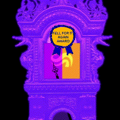 a purple statue with the words tell for it again award