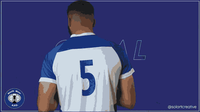 a man wearing a blue and white shirt with the word cork37 on it