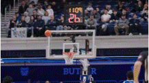 a basketball game is underway and the scoreboard shows 26 points
