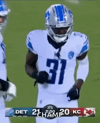 a football player wearing number 31 stands on the field