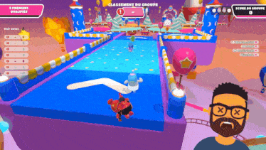 a man with glasses is playing a game called falling guys