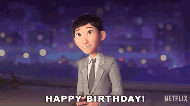 a man in a suit and tie says happy birthday netflix