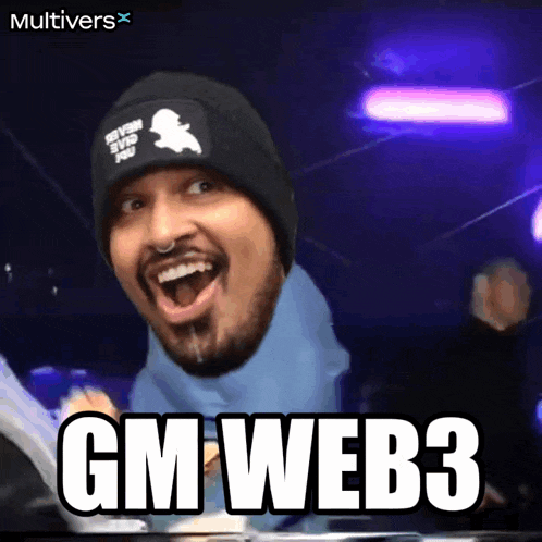 a man wearing a beanie with a sherlock holmes logo on it is smiling and says gm web3