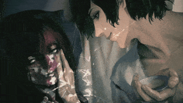 a man and a woman are standing next to each other and the woman has blood on her face