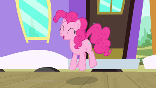 pinkie pie from my little pony standing in front of a purple building