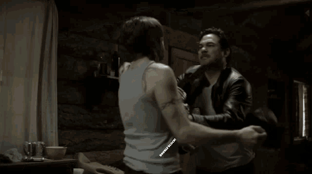a man is being attacked by another man with the words double block written above him