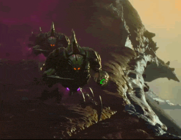 a group of monsters with red eyes are standing on a rock