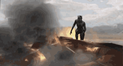 a black panther is standing on top of a burning object