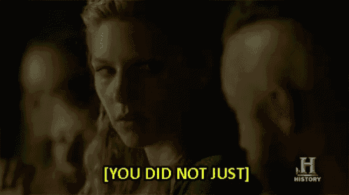 a woman says " you did not just " to a man in a dark room