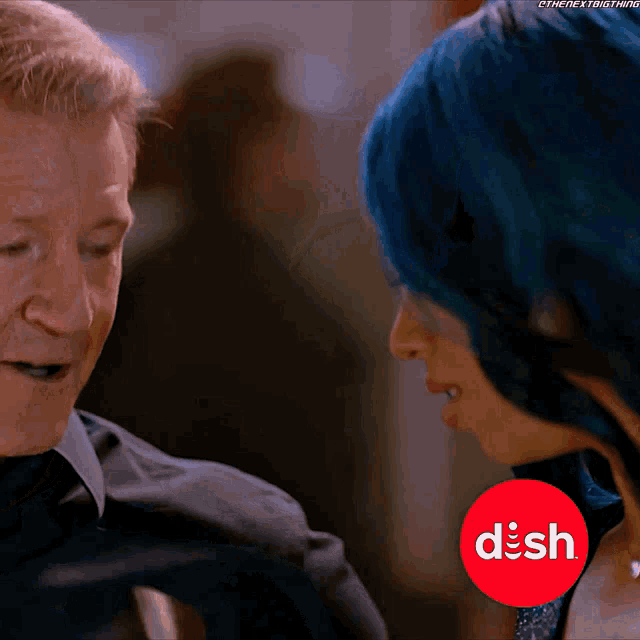 a man and a woman are looking at each other with a red circle that says dish