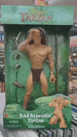 a disney tarzan action figure with a green box