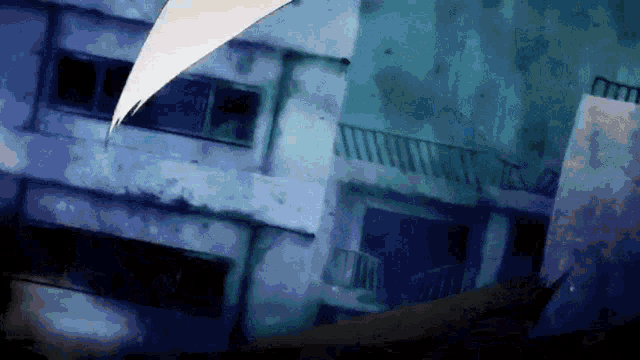 a very old building with a balcony and stairs in a dark room