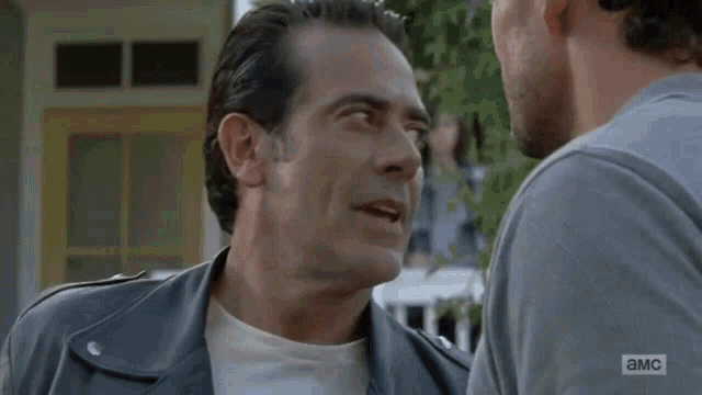 two men are looking at each other and one of them is saying it 's because ..