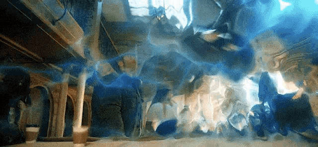 a room with a lot of smoke coming out of the ceiling .