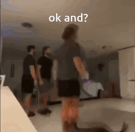 a blurry photo of a person standing in a room with the words ok and written on the bottom