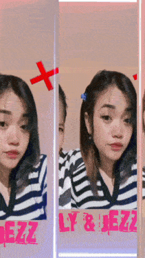 a girl in a striped shirt has a red cross on her head