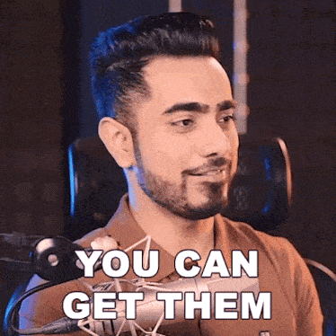 a man in front of a microphone with the words you can get them
