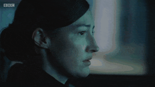 a close up of a woman 's face with the bbc logo on the bottom