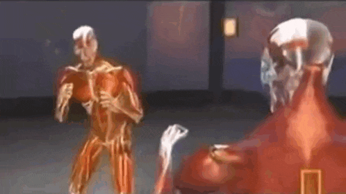 a skeleton is standing next to a glowing object .