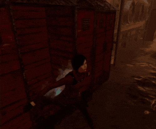 a person in a video game is standing in front of a red container that says ' container ' on it