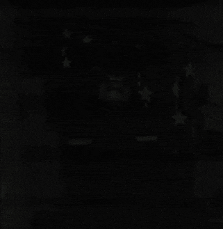 a black background with a few white stars on it .