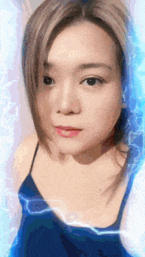 a close up of a woman 's face with a lightning bolt behind her
