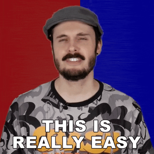 a man with a beard is wearing a hat and a shirt that says this is really easy