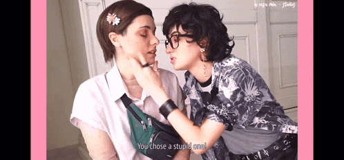 a couple kissing with the words you chose a stupid one